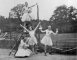 Tennis court at Treetops Holiday Camp Farley Green with ballet dancers c1935